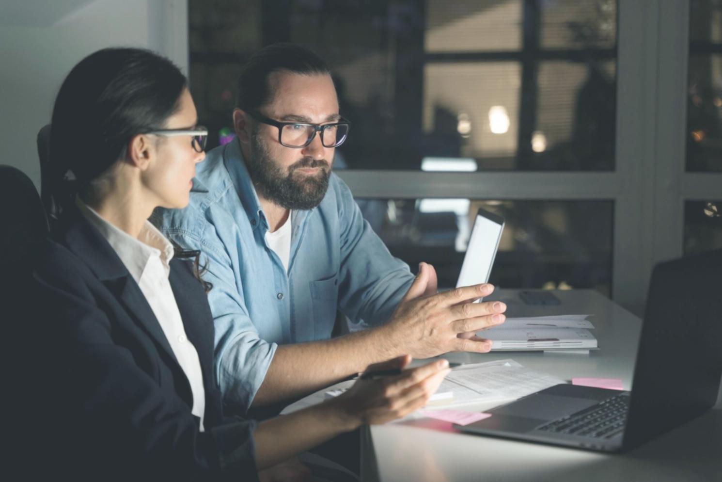 Online learning materials displayed on laptop with financial charts